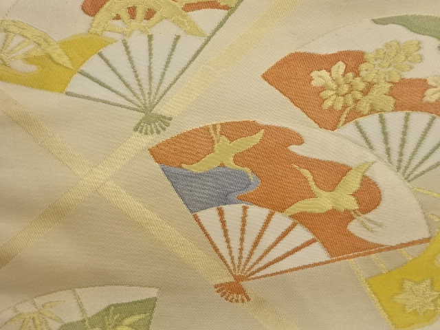  襷に扇・草花・鶴・片輪車模様織出し袋帯